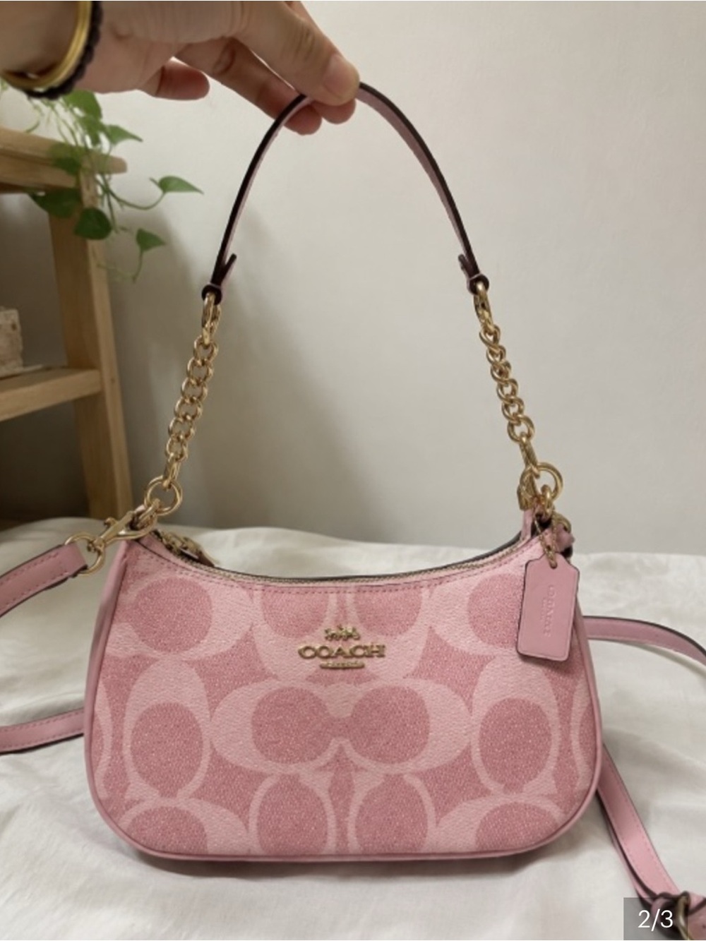 Coach Pink Signature Small
Shoulder Bag with Gold
Hardware